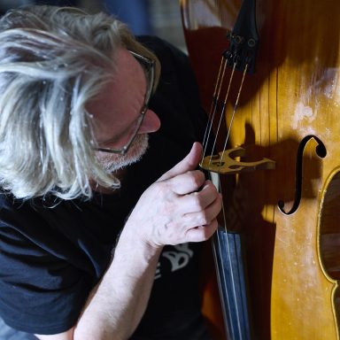 Peter Nagle with upside-down cello.